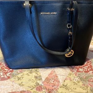 Michale Kors large zip top tote.